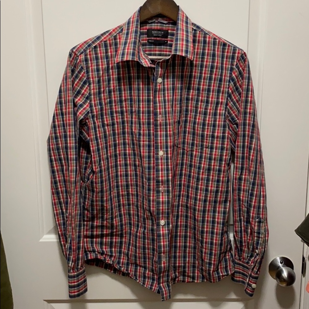 A classic patterned plaid long sleeve button down
